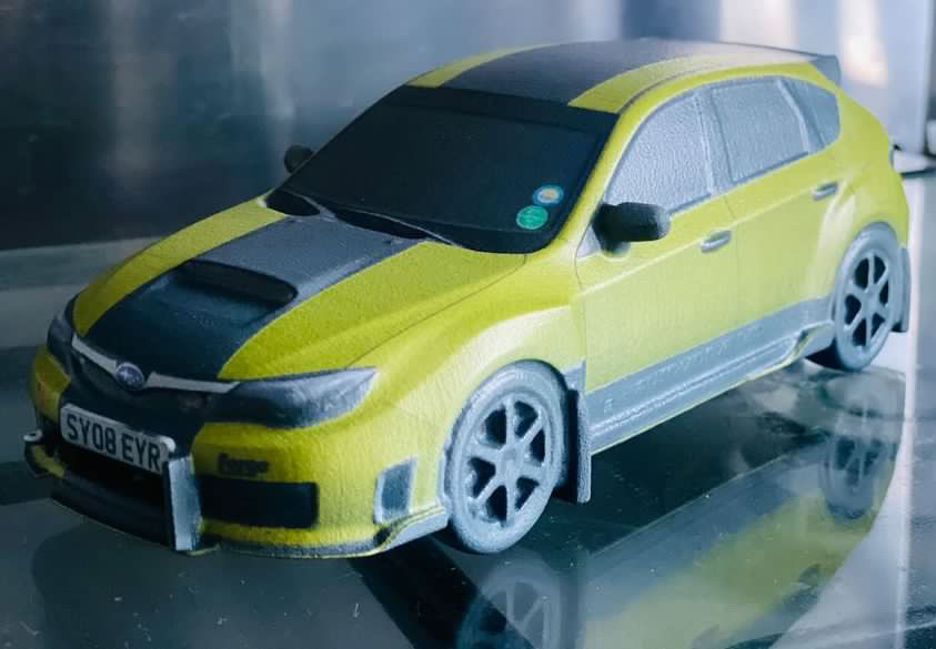 Side profile of a custom rally car model.