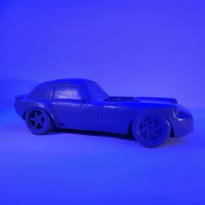 A resin-printed replica of a fully custom-built project car, available in multiple colors.