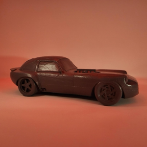 A resin-printed replica of a fully custom-built project car, available in multiple colors.